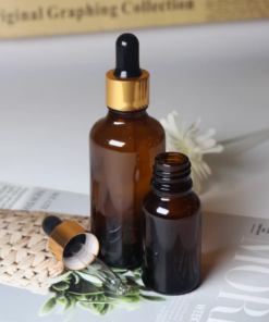 Wholesale Amber Essential Oil Dropper Bottle With Black Nip And Gold Aluminium Neck