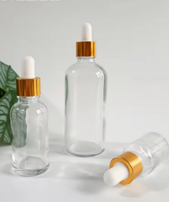 Wholesale Clear Dropper Bottle With Gold Neck White Nip
