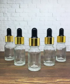 Wholesale Clear Bottle With Gold Neck And Black Nip
